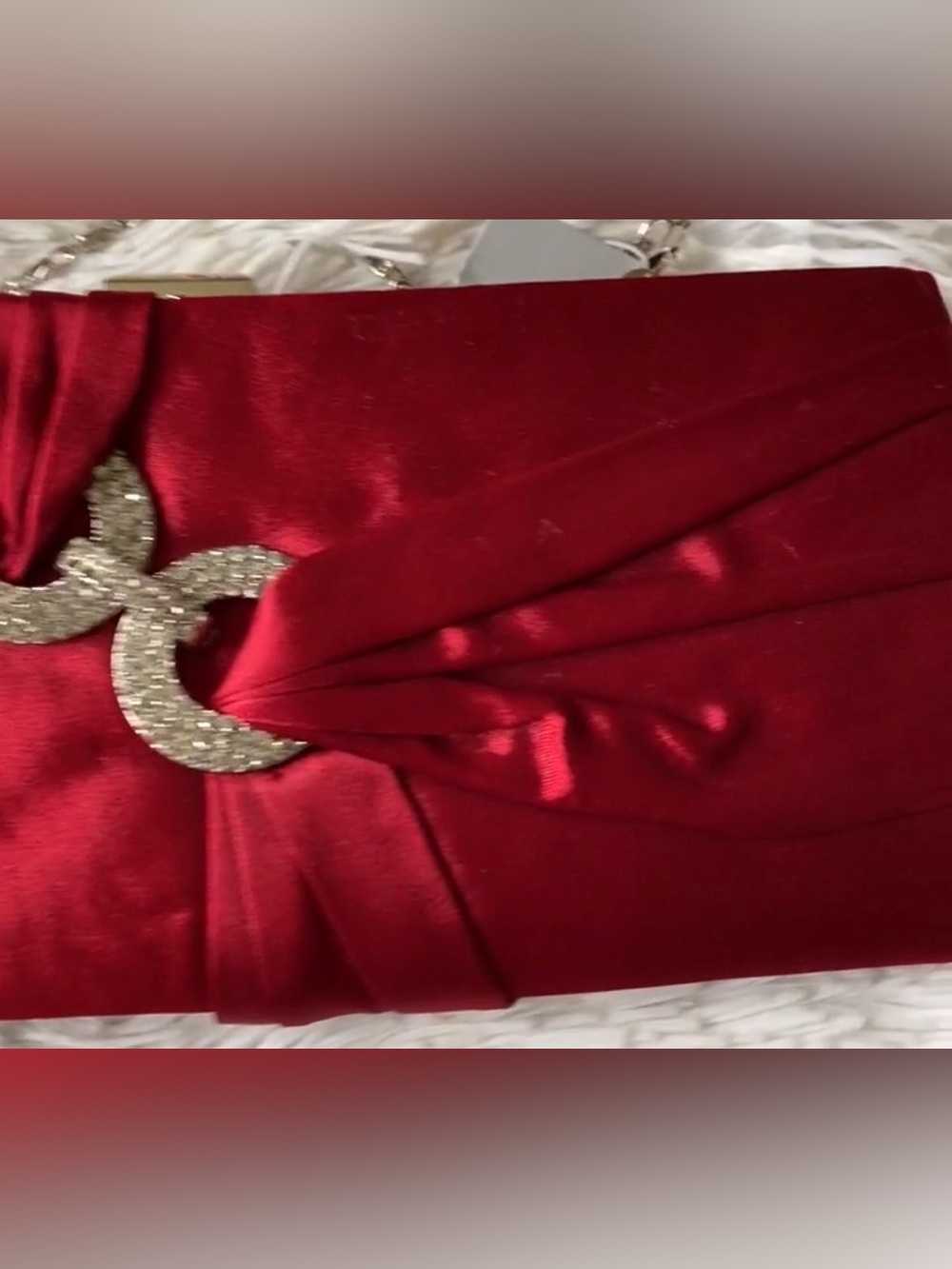 Celebrations  red satin evening clutch bag